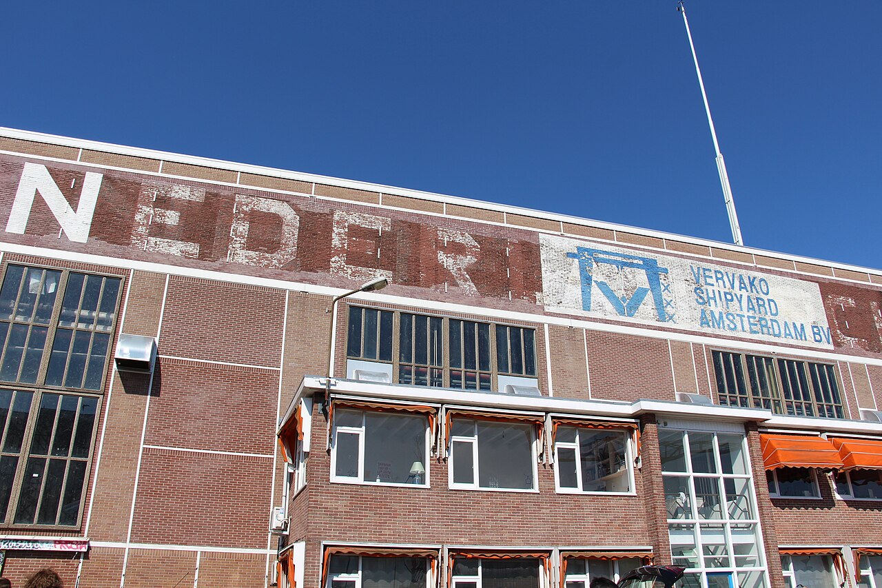 Facade of a hall at the former NDSM shipyard, home to the IJ-Hallen market