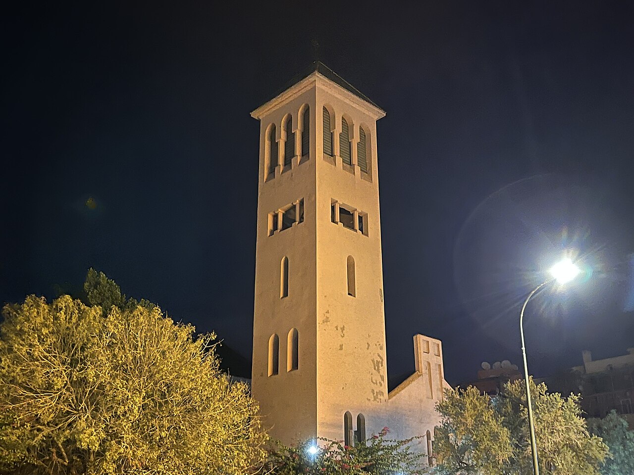 The bell tower of the Church of the Holy Martyrs, in Gueliz