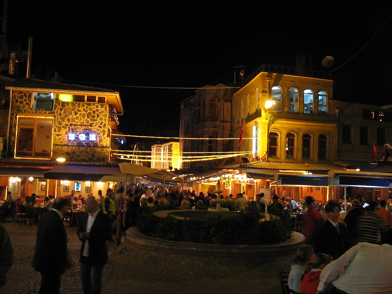 A Kumkapı square in the evening, between restaurant terraces