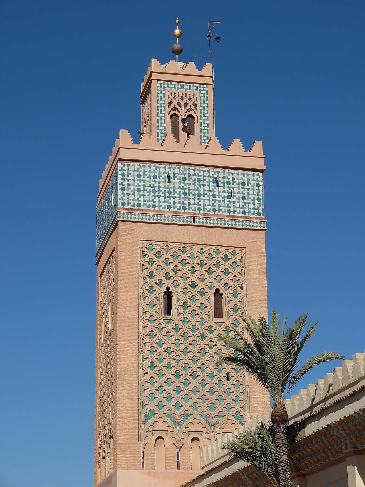 Minaret of the Kasbah Mosque, decorated with interlacing patterns and green ceramic