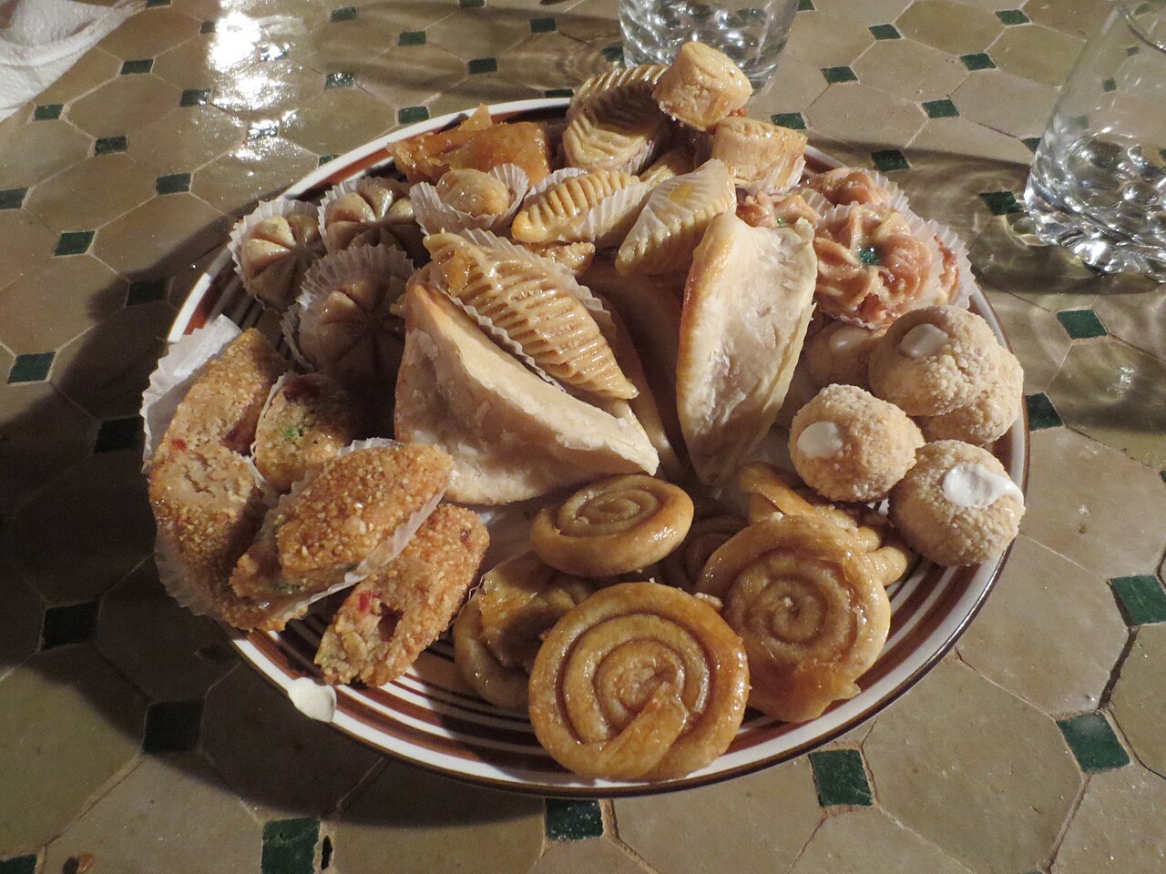 A plate of Moroccan pastries: gazelle horns, ghriba and almond cakes