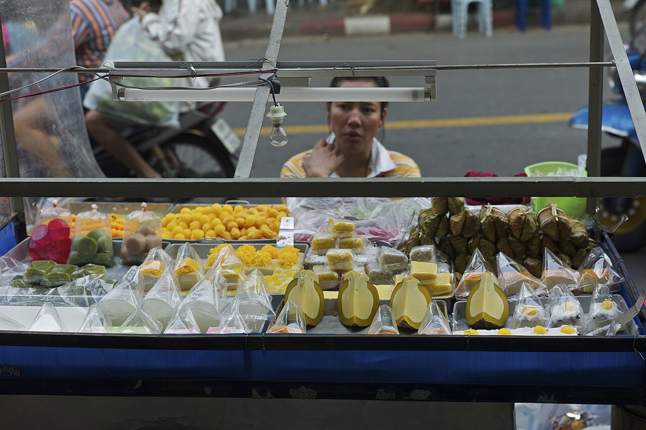 A stall of Thai sweets on a Bangkok pavement